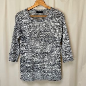 The limited variegated knit sweater